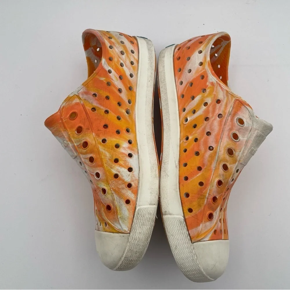 Native orange swirl slip on size 2 water shoes